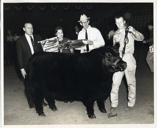 George Wheel (Farm Foreman), center